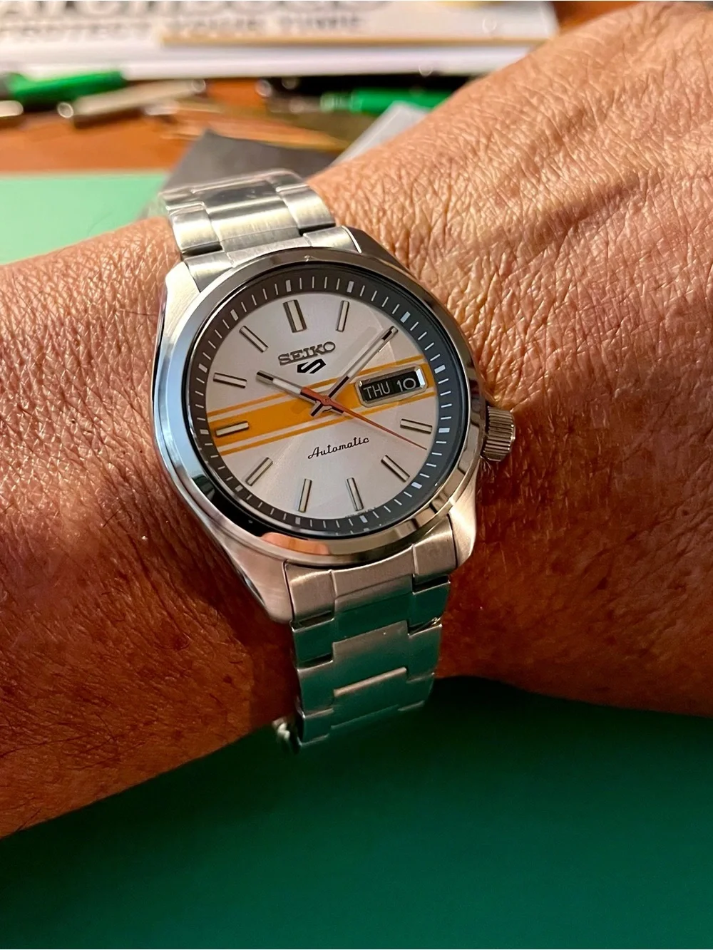 Seiko : RETRO GT Silver Watch with Orange Stripe and Orange Seconds Hand SRPE51